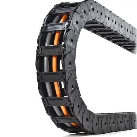 Black flexible drag chain cable carrier bending around a curved path with internal electrical cables, designed to protect and guide moving cables in CNC machines, robotics, and industrial automation equipment.