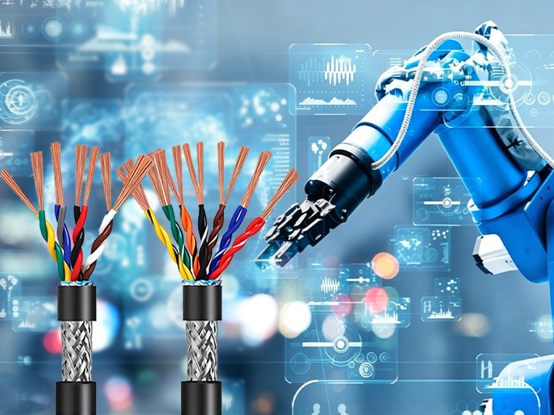 HULK heavy-duty dual bundle twisted multi-core cables with metallic braided shielding structure, matched with blue robotic manipulator under futuristic data HUD backdrop, designed for anti-interference signal transmission in automated production workshops
