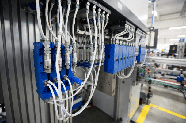 Multiple M12 sensor cables connected in typical industrial automation setup showing ruggedness and versatility