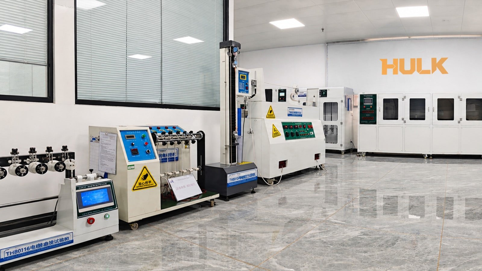 HULK cable testing laboratory featuring THB0116 wire bending tester, vertical flexing machine, and environmental aging chambers, demonstrating rigorous quality control for industrial cable durability and performance.