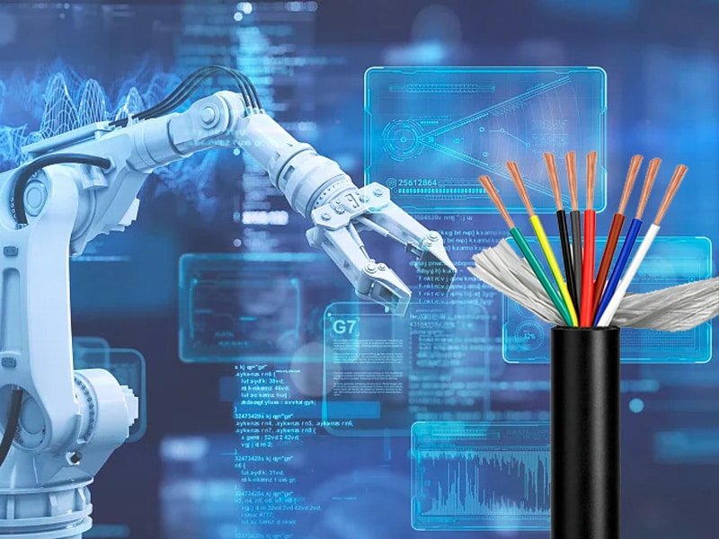 HULK heavy-duty torsion-resistant multi-core cable, displayed alongside precision industrial robotic arm with futuristic data HUD background, suitable for robot motion transmission and automated production line wiring