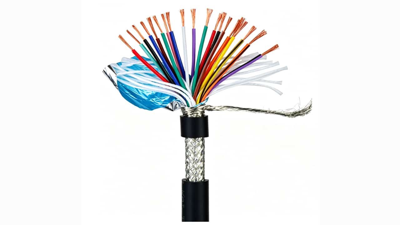 Cross-section of HULK high-flex drag chain cable showing multi-colored insulated conductors with tinned copper strands, wrapped in braided and foil shielding layers under black outer jacket — engineered for continuous flexing in automated machinery with superior EMI