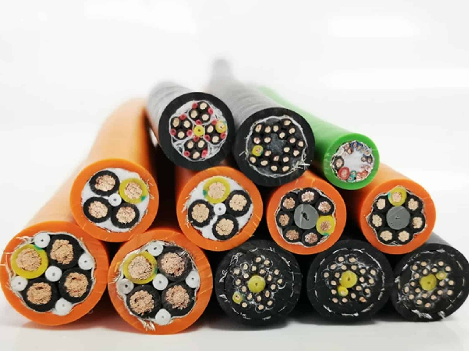 HULK high-flex servo cables with tinned copper conductors, color-coded insulation, dual-layer shielding (foil + braid), and multiple core configurations in orange, black, and green jackets for noise-resistant signal transmission in robotics, CNC machines, and servo systems.