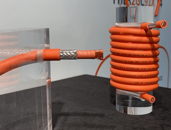 Close-up of flexible high-temperature silicone cables connected in an industrial electrical control panel, highlighting robust insulation for reliable dielectric performance and high-voltage applications