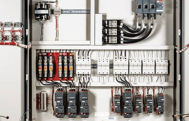 View of industrial cable trays containing power lines and shielded sensor cables highlighting proper separation and EMI management in plant environments