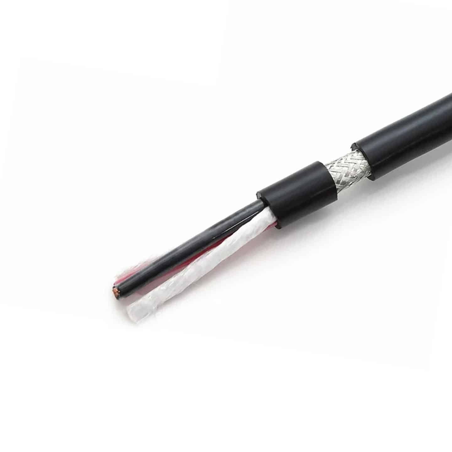 HULK high-flex shielded data cable cross-section showing red-black insulated conductors twisted in pairs, surrounded by a dense braided metallic shield and white filler material; engineered for low capacitance and EMI immunity in high-frequency signal transmission between sensors, encoders, and PLCs in industrial automation systems.