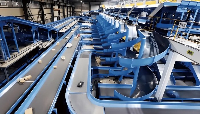 Hulk Cable automated sorting system application scene showing integrated high-flex shielded cables within blue spiral conveyor and belt system, demonstrating reliable cable performance in high-density logistics automation environments