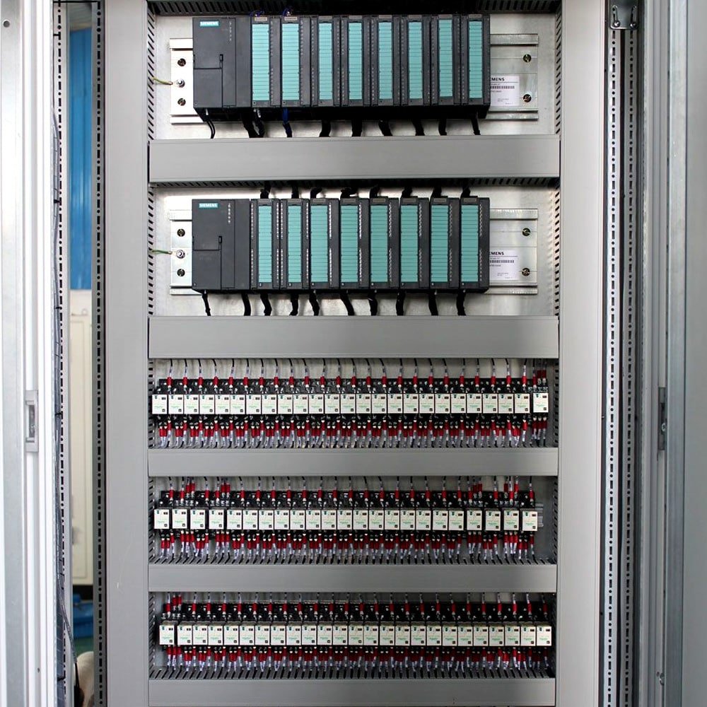 Hulk Cable high-density anti-interference cabling solution for Siemens S7 PLC automation control cabinet, featuring blue and black shielded cables routed along DIN rails and terminal blocks for stable signal and power transmission in multi-module, high-frequency data exchange environments